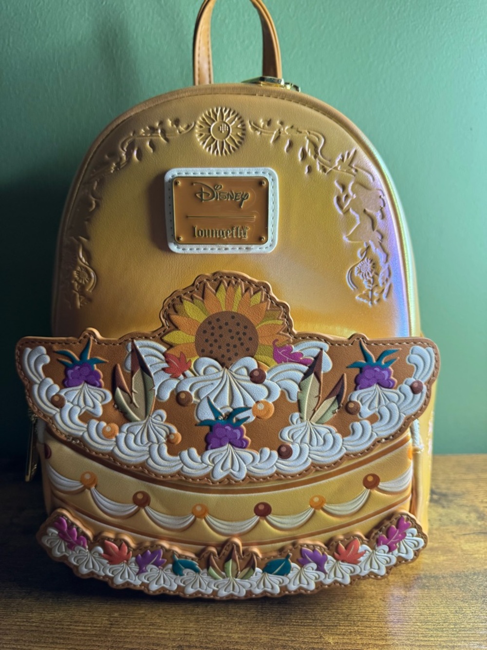 Loungefly Disney Pocahontas Yellow Sunflower & Floral Cake Mini Backpack
